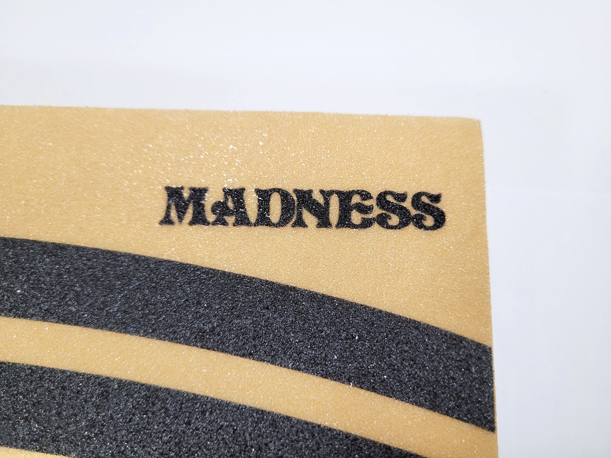 Madness Swirl Griptape 10″ CLEAR/BLACK - SkatebruhSG